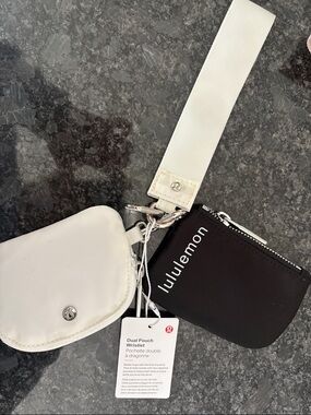 lululemon athletica Dual Pouch Wristlet in Black and White with Wide Strap
